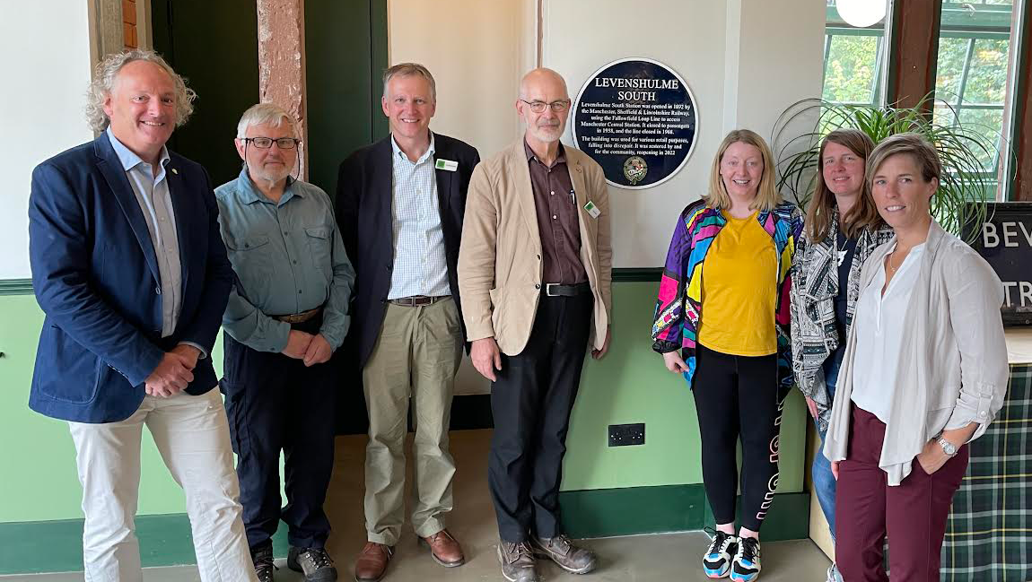 The unveiling of an RHT plaque at the former Levenshulme South Station on 5 July 2022